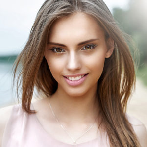 Beautiful smiling girl portrait close up