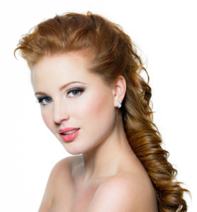 Attractive red-haired female with beautiful face