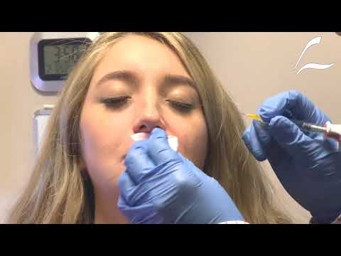 Dallas Facial Plastic Surgeon Dr. Lam performs a lip filler Injection.