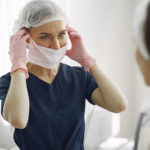 Woman with a doctor in cosmetology studio